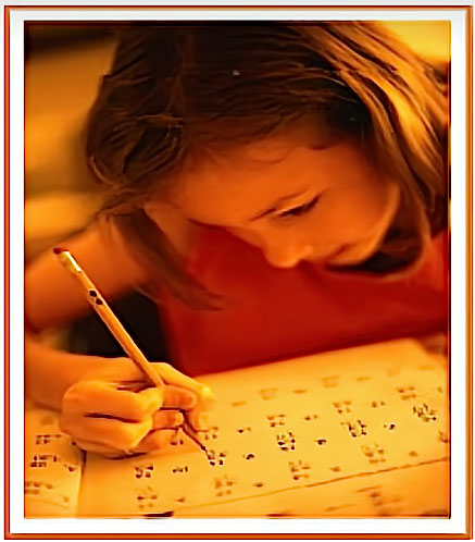 Child writing at a desk